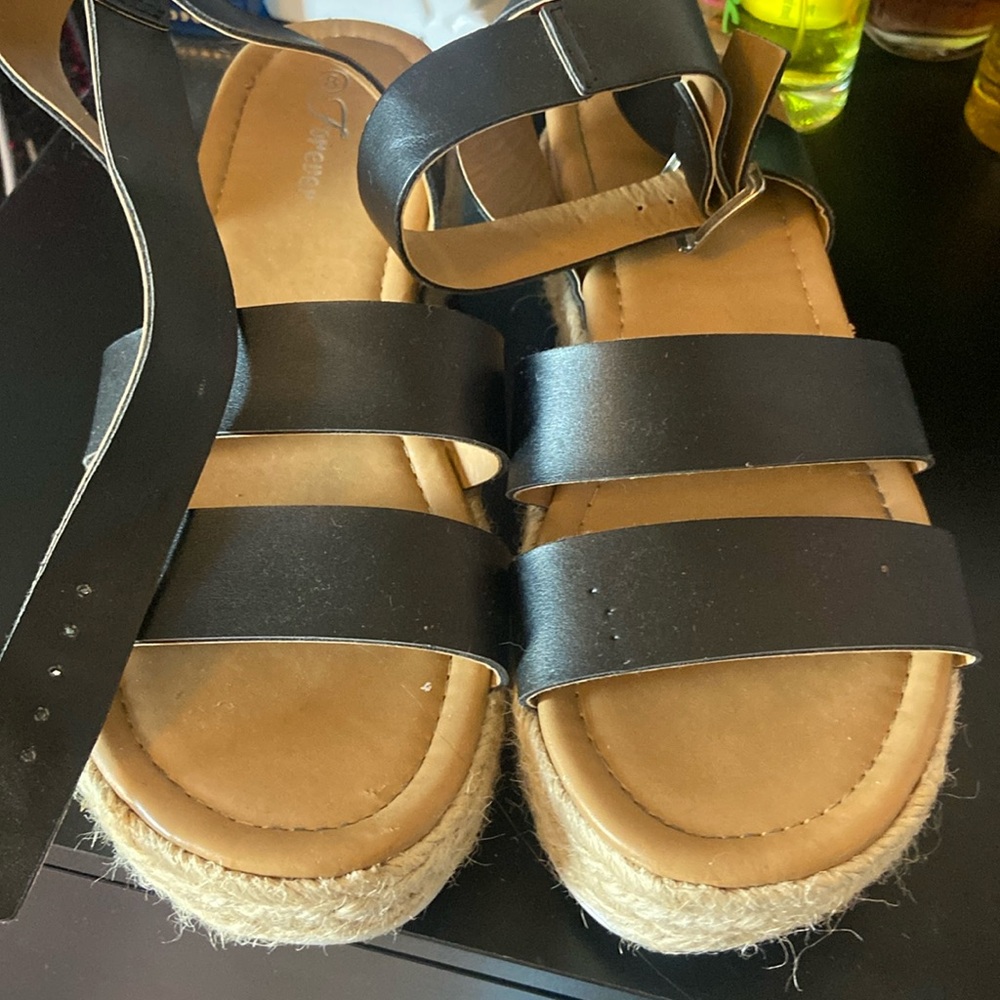 Lightly used lifter sandals